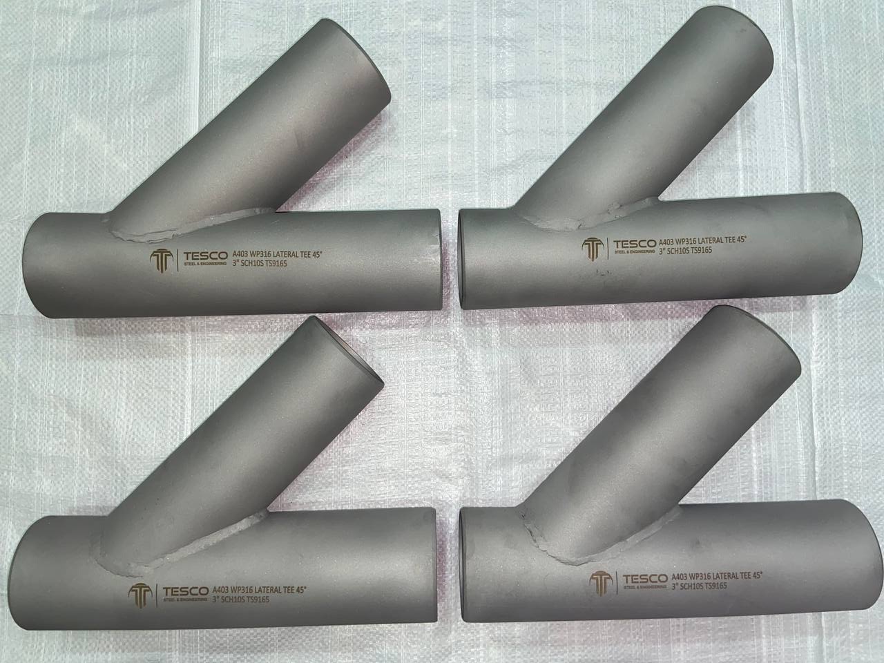 45 degree lateral tees in ASTM A403 WP316 stainless steel, hard-stamped — Tesco Steel & Engineering