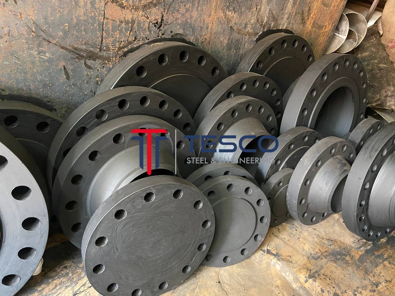 ASTM A105 carbon steel blind flanges various sizes in stock at Tesco Steel & Engineering warehouse Mumbai India — carbon steel blind flange manufacturer exporter