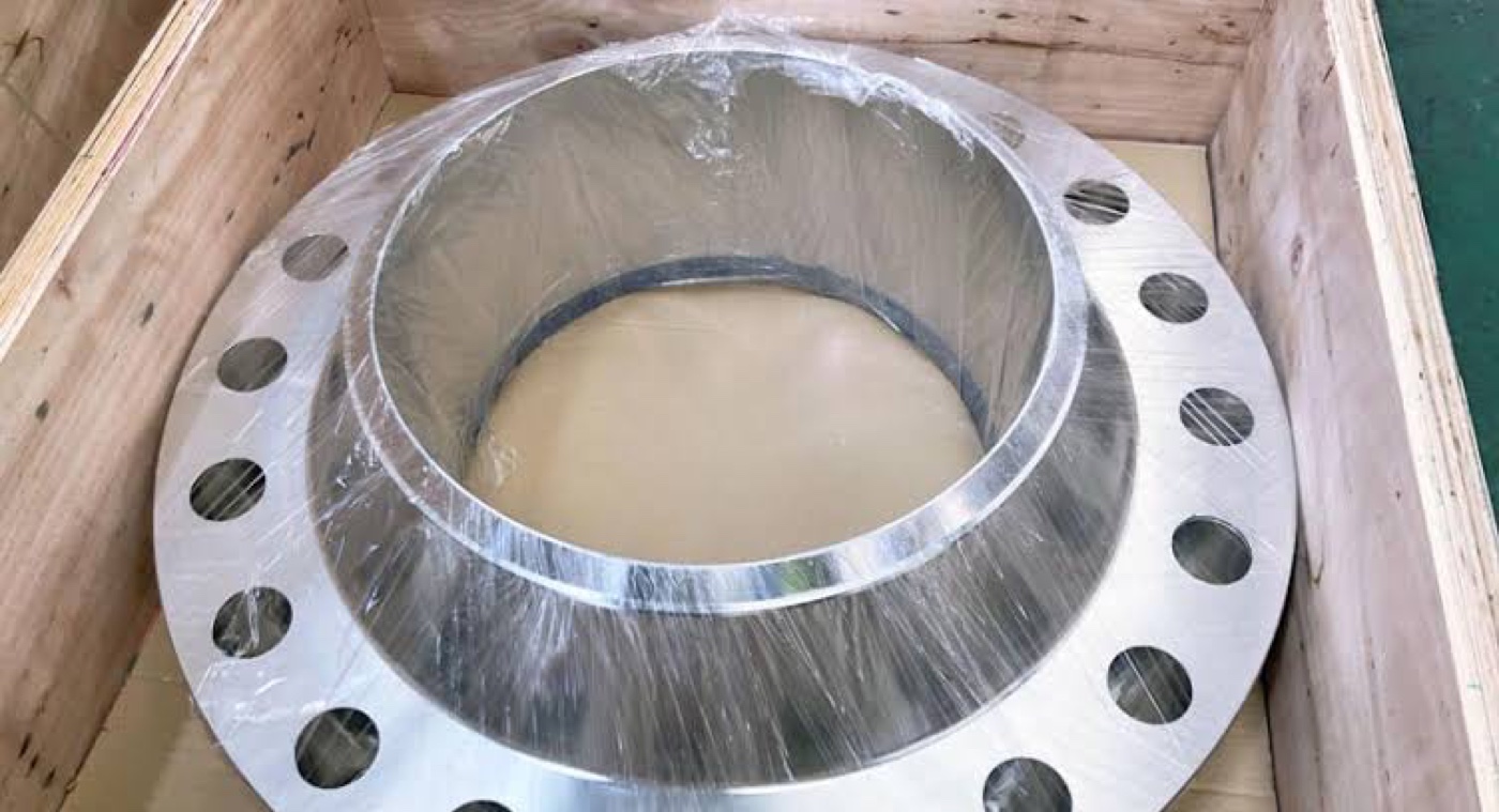 Large diameter ASTM A182 F304L stainless steel weld neck flange wrapped and packed in wooden export crate — Tesco Steel & Engineering