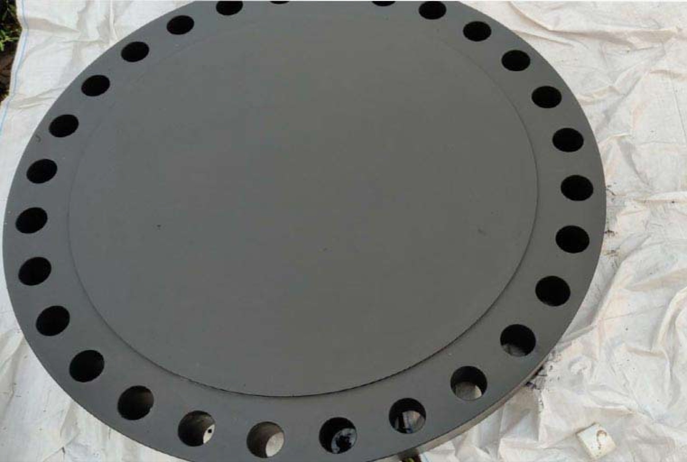 Large ASTM A350 LF2 low temperature carbon steel blind flange black coated with raised face