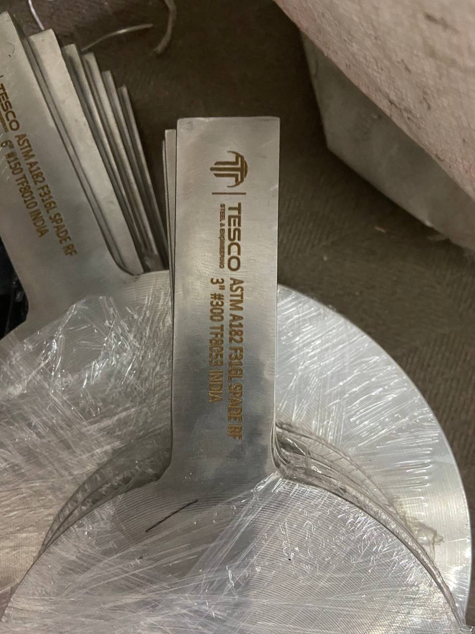 Batch of Monel 400 spades paddle blanks 3 inch Class 300 individually plastic-wrapped and stacked — ASTM B564 UNS N04400, Tesco Steel & Engineering India