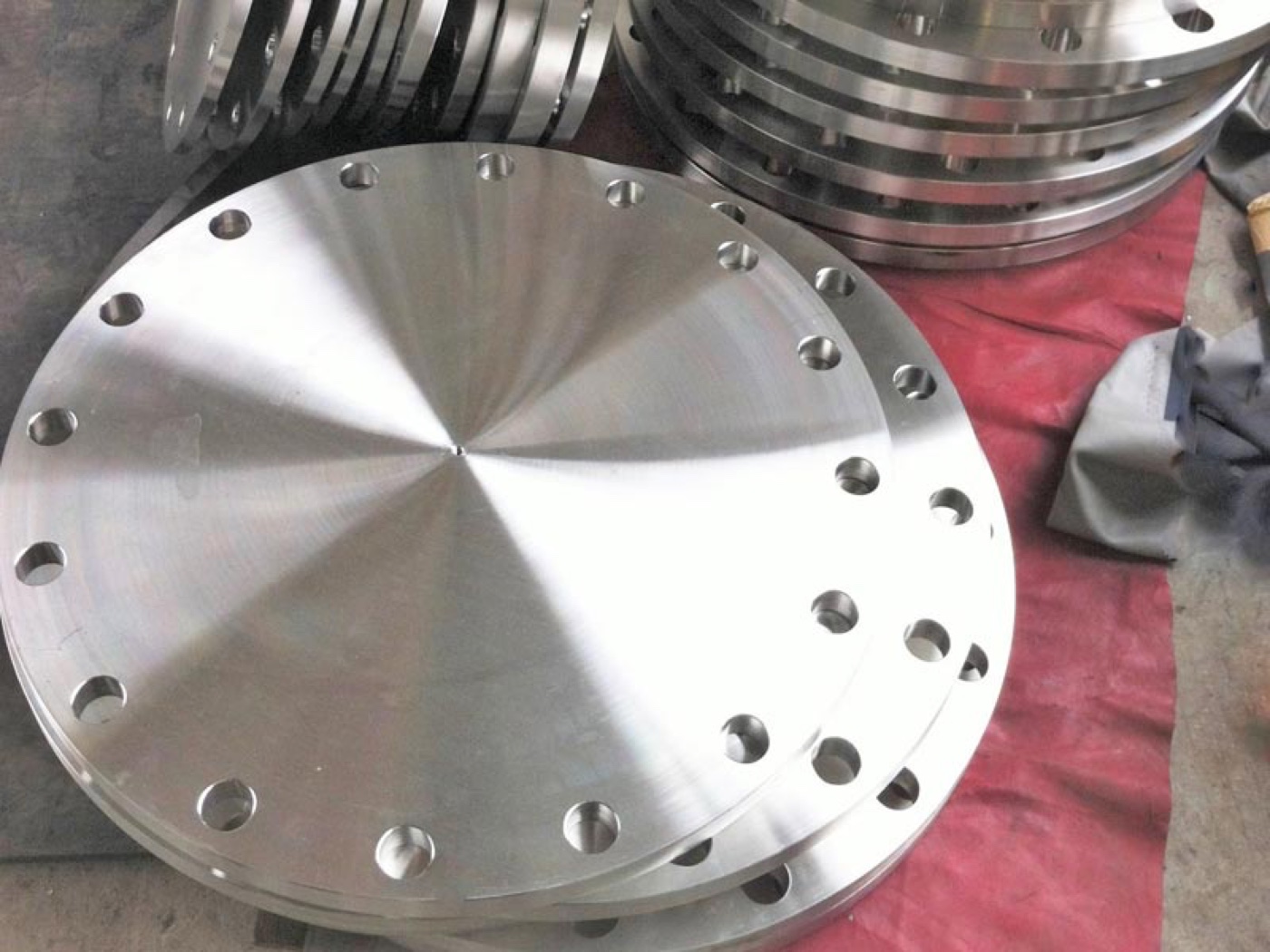 Large BLFF blind flat face flanges machined with full flat gasket surface at Tesco Steel & Engineering, India