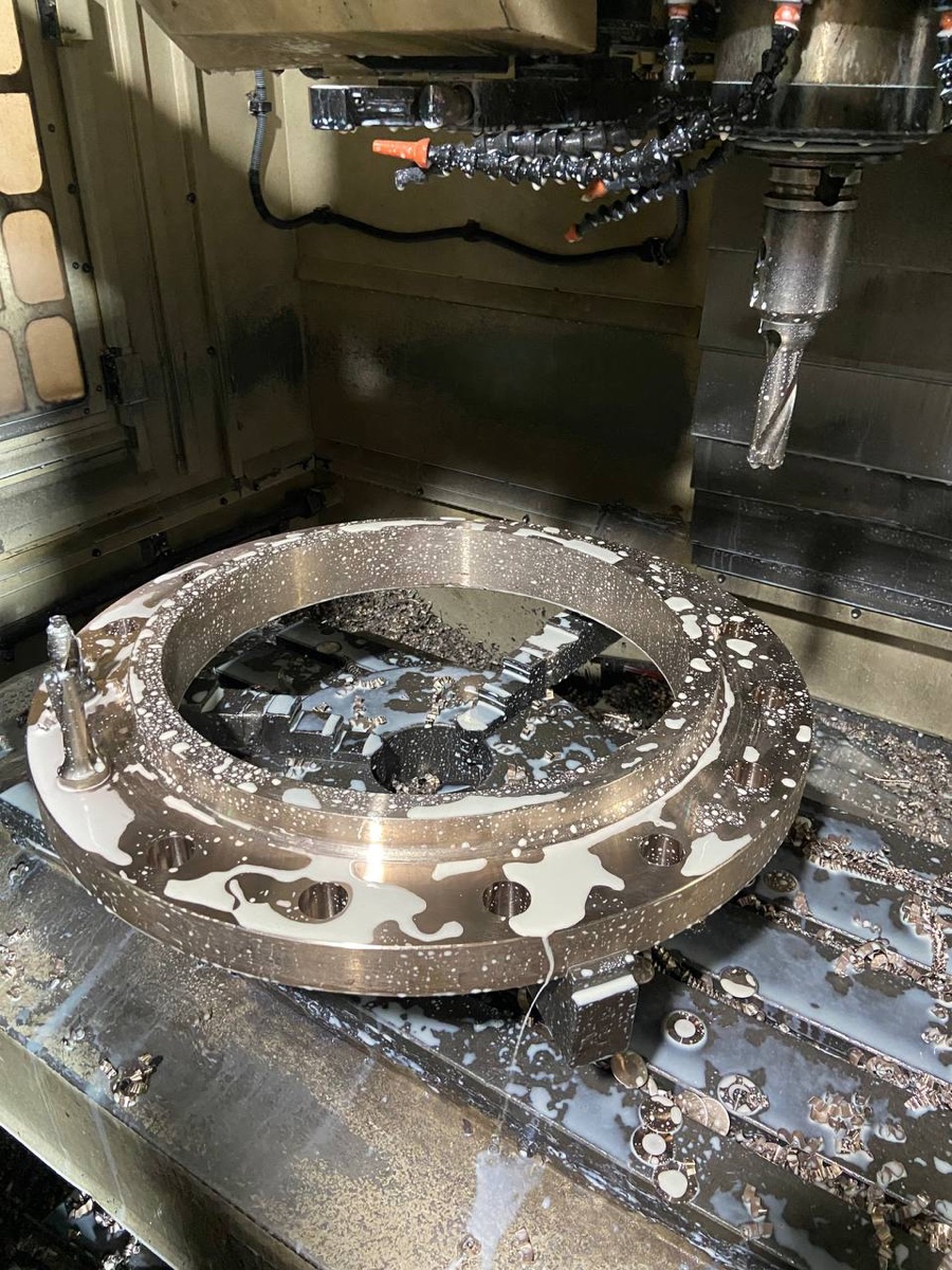 C71500 copper nickel flange bolt holes being drilled on CNC machining centre — Tesco Steel & Engineering