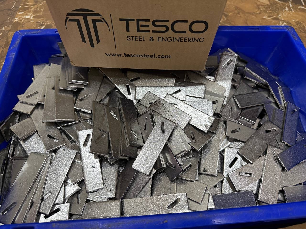 Ceramic fibre blanket fixing studs packed in Tesco Steel & Engineering boxes ready for export shipment worldwide