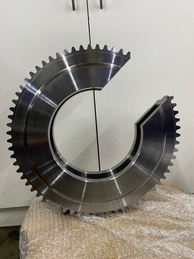 CNC machined split gear ring in stainless steel with precision cut teeth and machined bore — Tesco Steel & Engineering