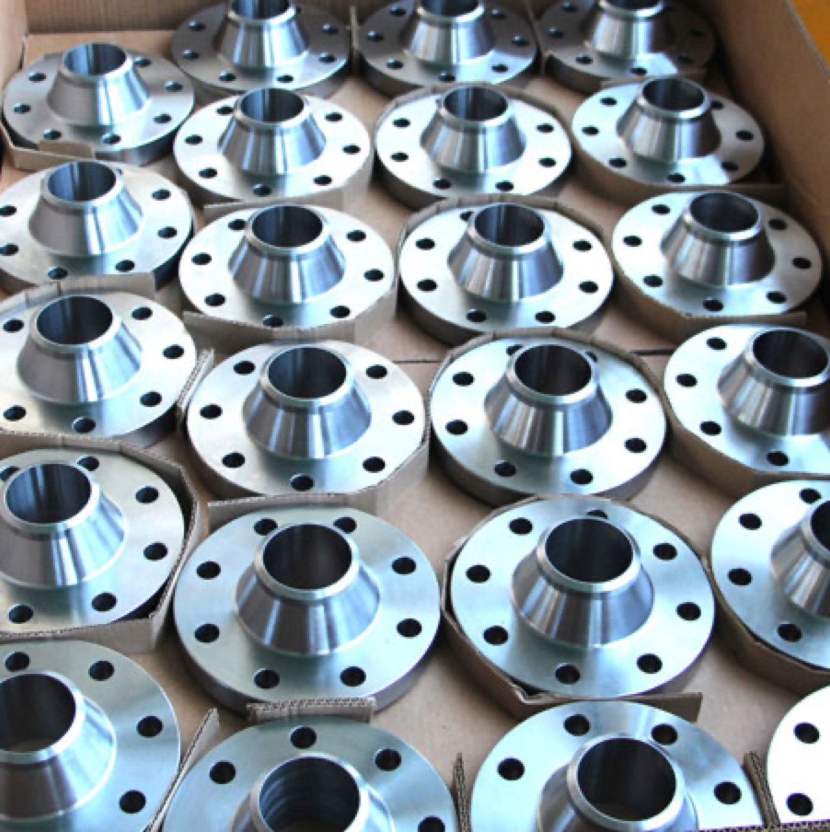 Incoloy 800HT weld neck flanges machined and packed in carton for dispatch — Tesco Steel & Engineering