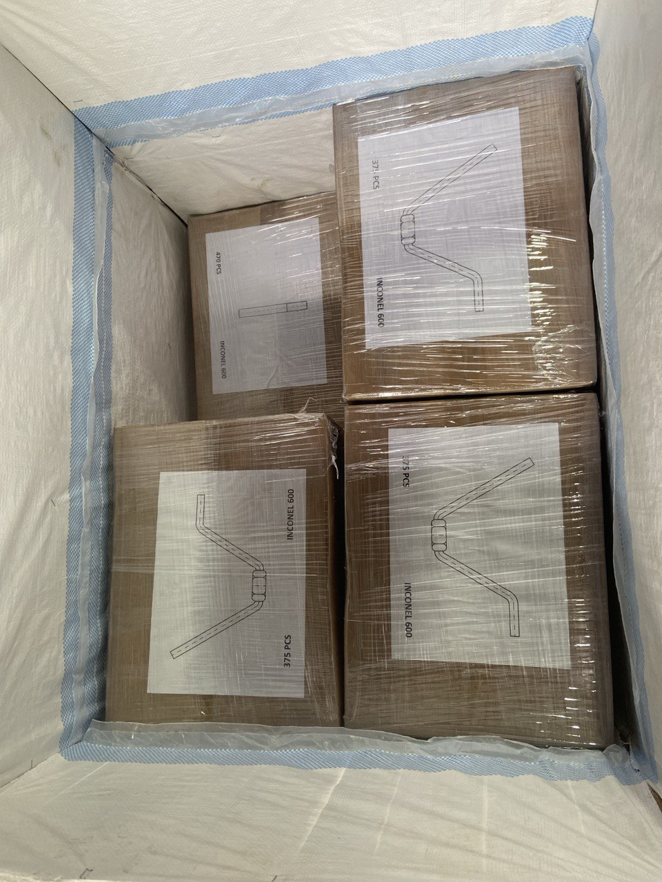 Inconel 600 refractory anchors packed in labelled export crates by Tesco Steel & Engineering