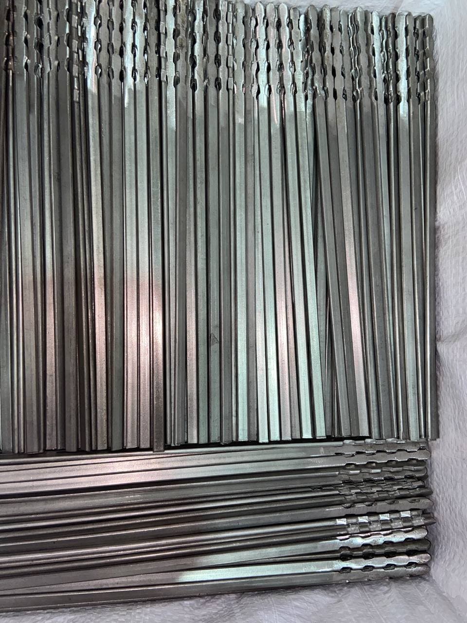Insultwist studs — serrated twist-lock ceramic fiber blanket anchors in SS310 by Tesco Steel & Engineering
