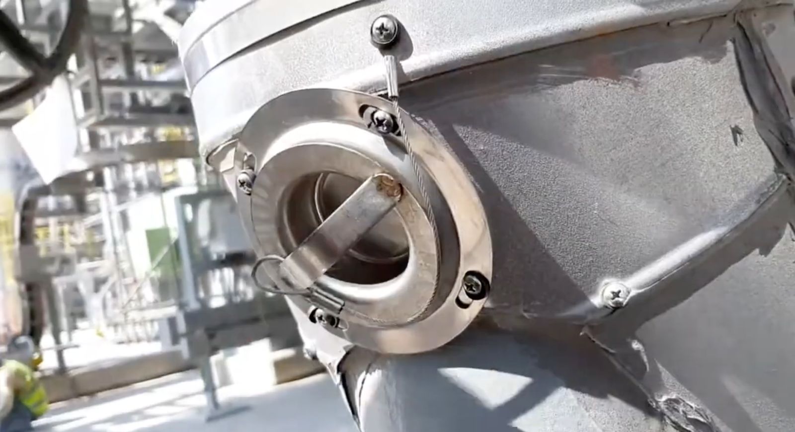 Stainless steel metal cap inspection plug with handle installed on vessel insulation cladding for CUI inspection access