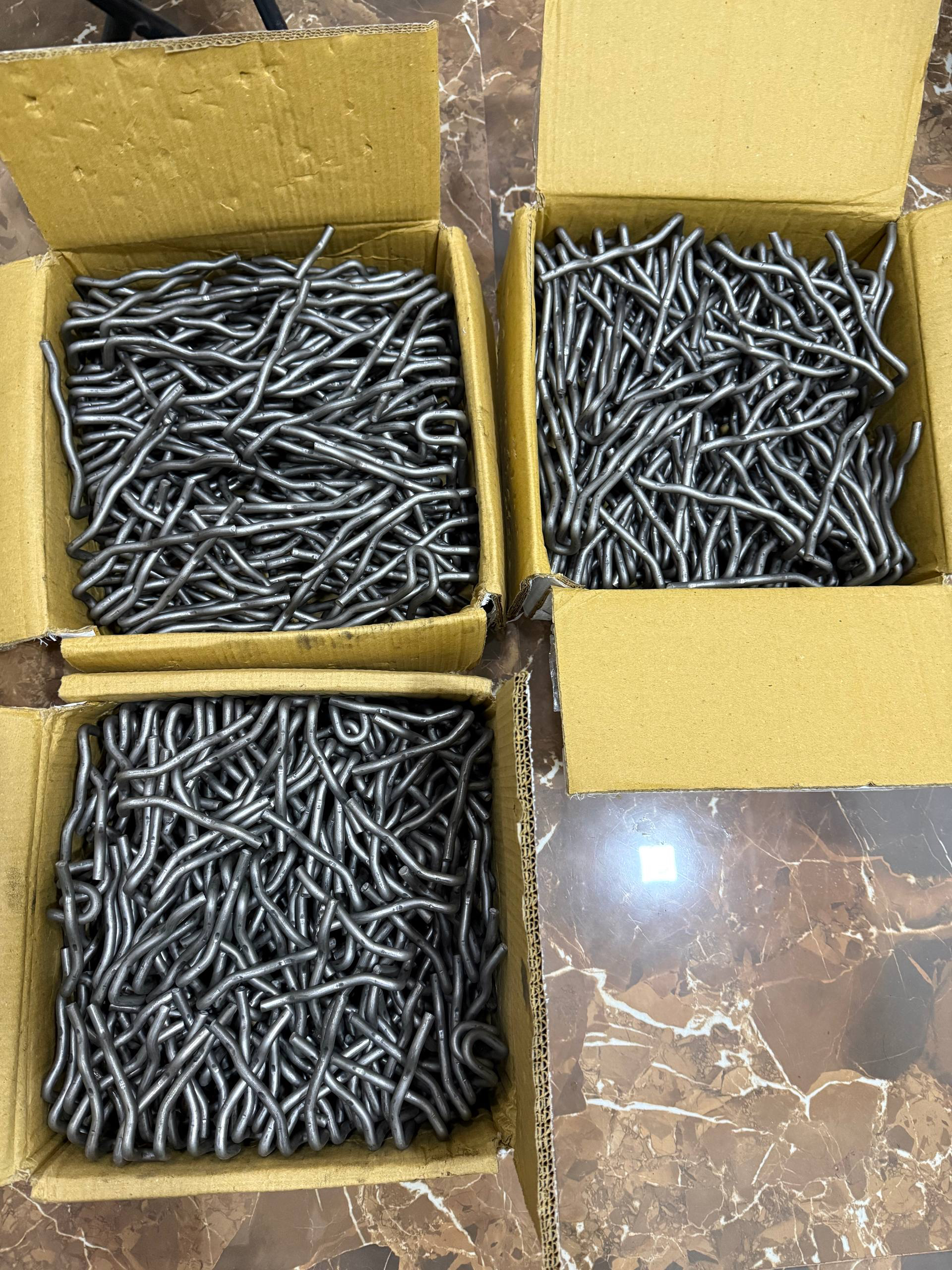Refractory anchors packed in export boxes ready for worldwide shipment