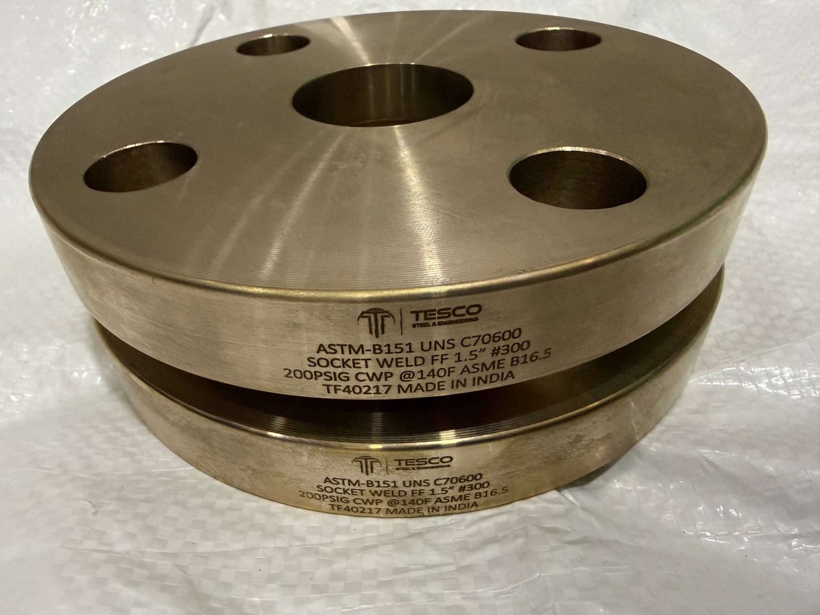 Copper nickel C70600 socket weld flat face flanges, 1-1/2 inch Class 300 ASME B16.5, laser-marked — Tesco Steel & Engineering