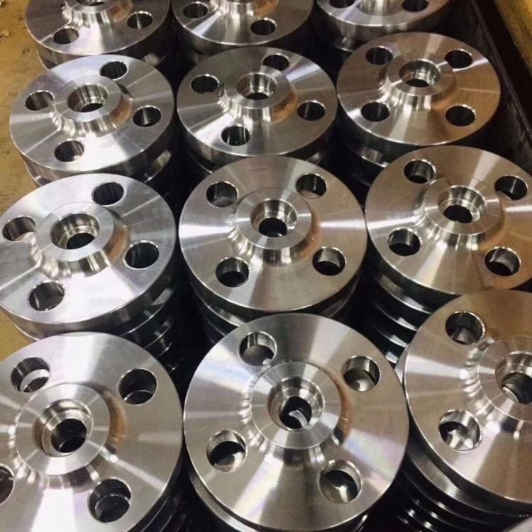 Machined batch of socket weld raised face flanges ready for inspection and dispatch