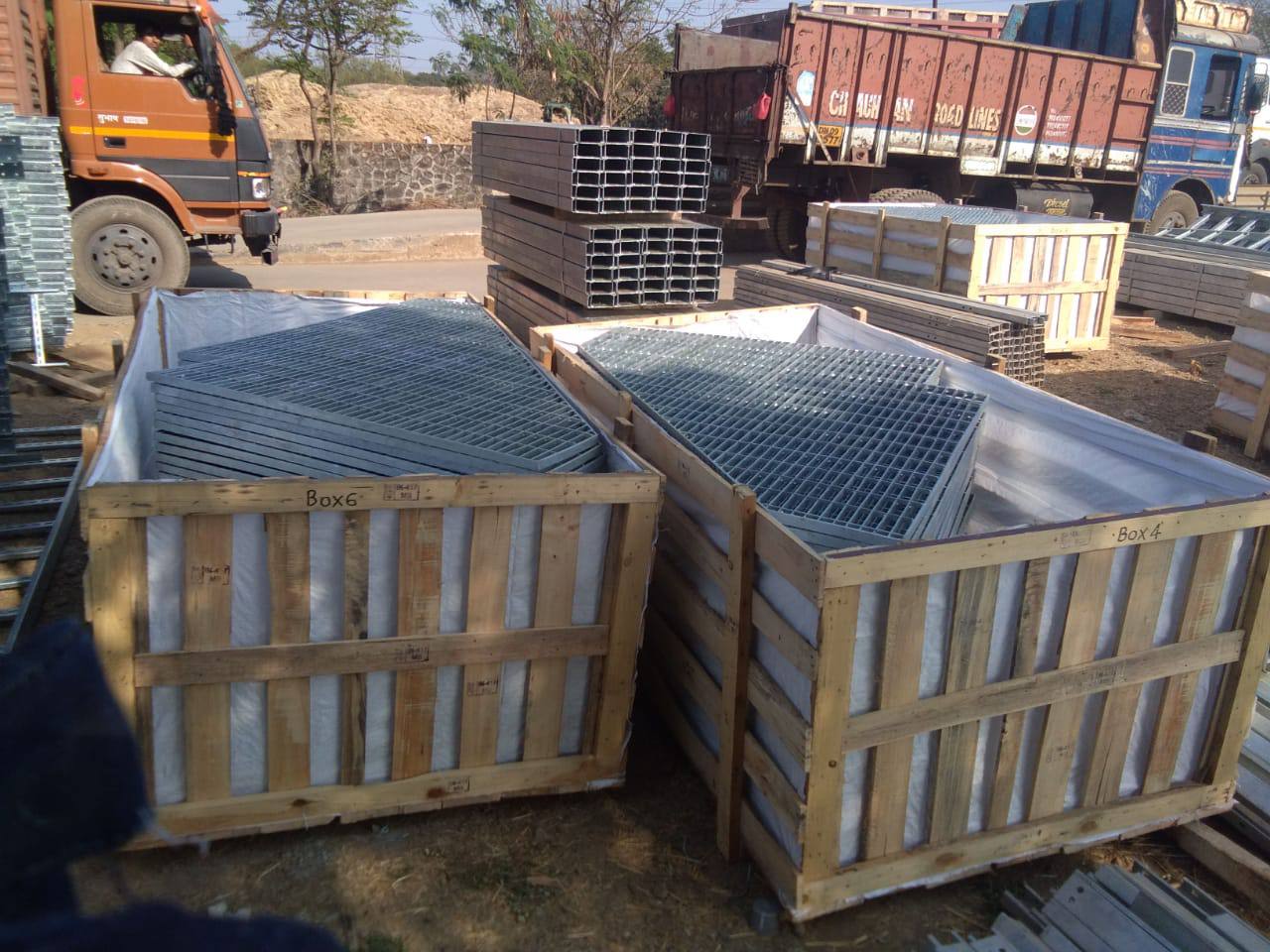 Steel grating panels in wooden export crates ready for worldwide shipment — Tesco Steel & Engineering