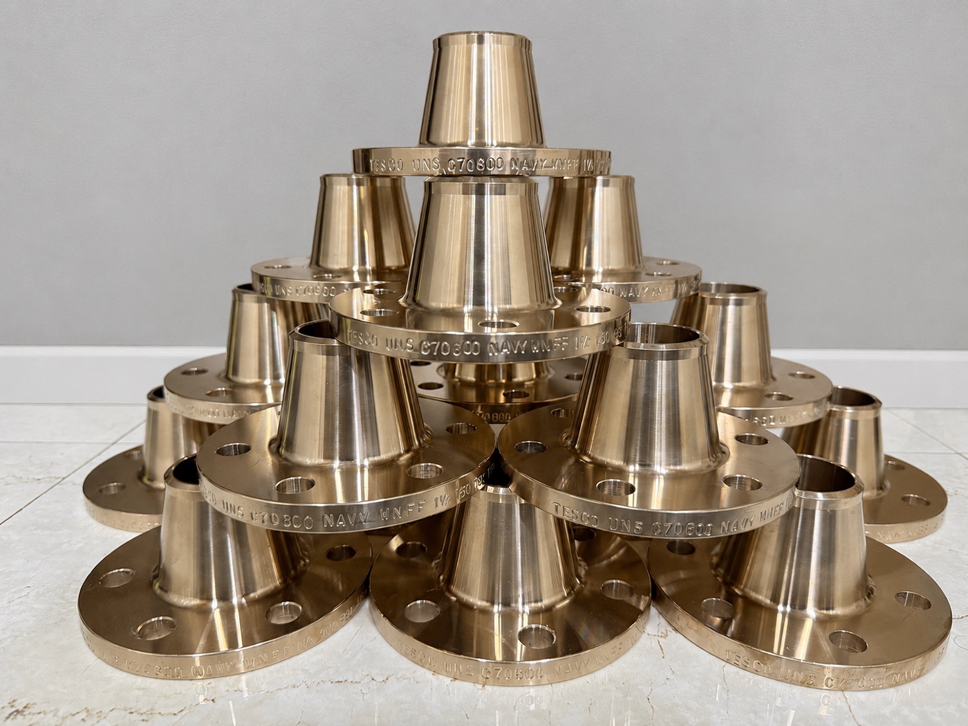Tesco UNS C70600 copper nickel 90/10 Navy WNFF weld neck flanges 1.5 inch 150# stacked in pyramid